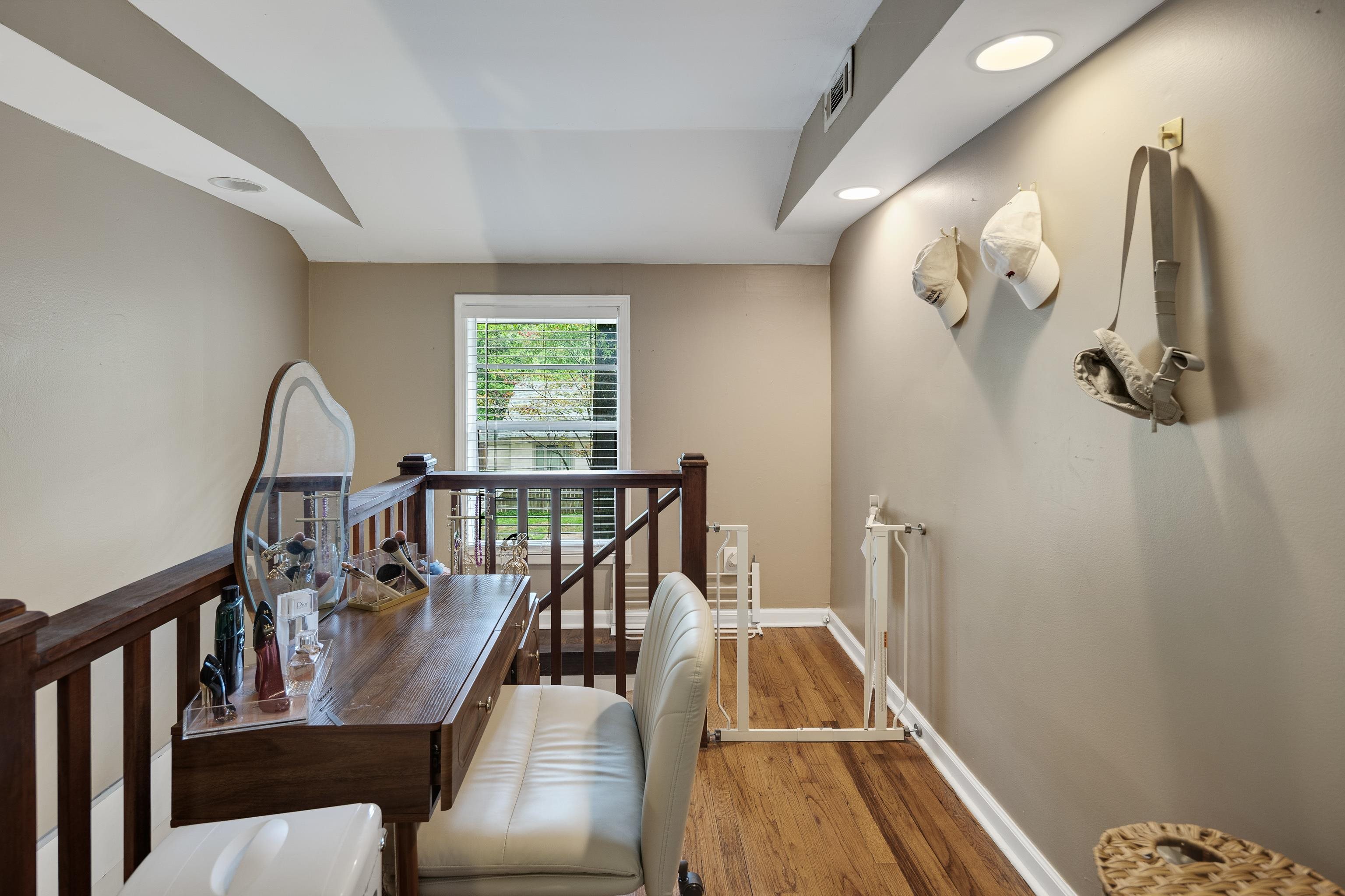 555 South Holmes Street Memphis, TN 38111 - Photo 27 of 40 a view of a hallway with wooden floor and stairs