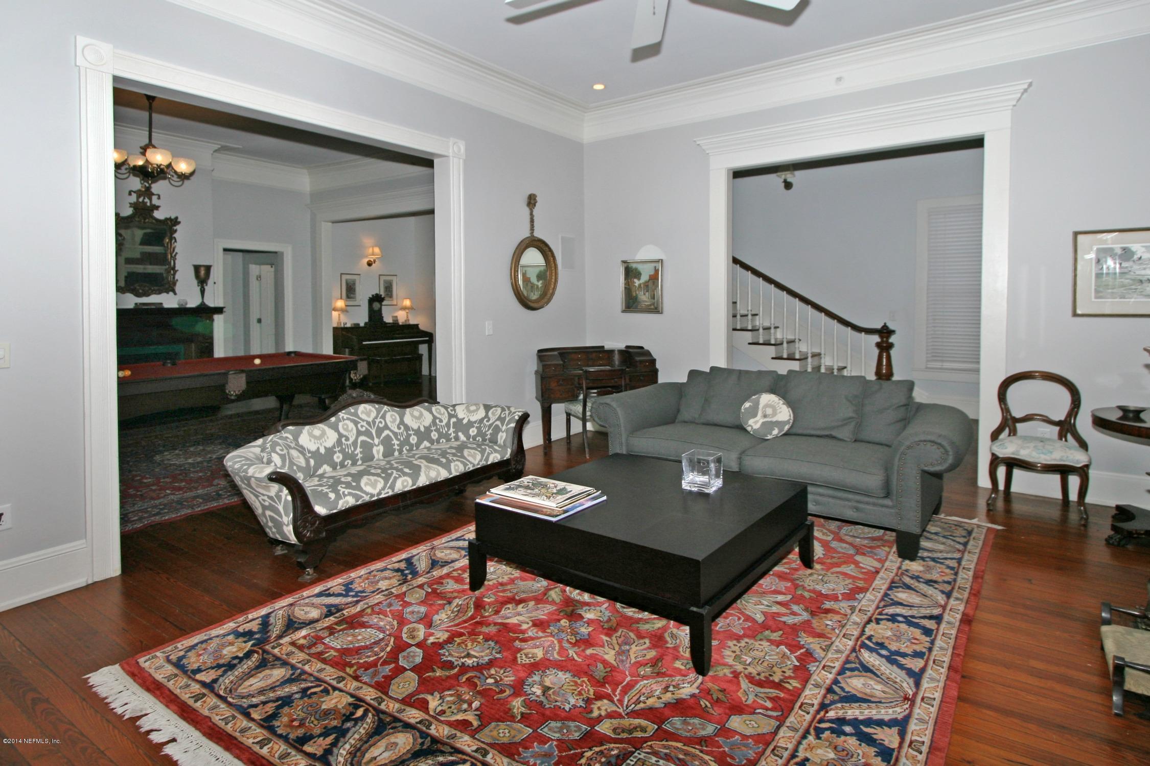 48 Water Street St. Augustine, FL 32084 - Photo 12 of 52 a living room with furniture and wooden floor