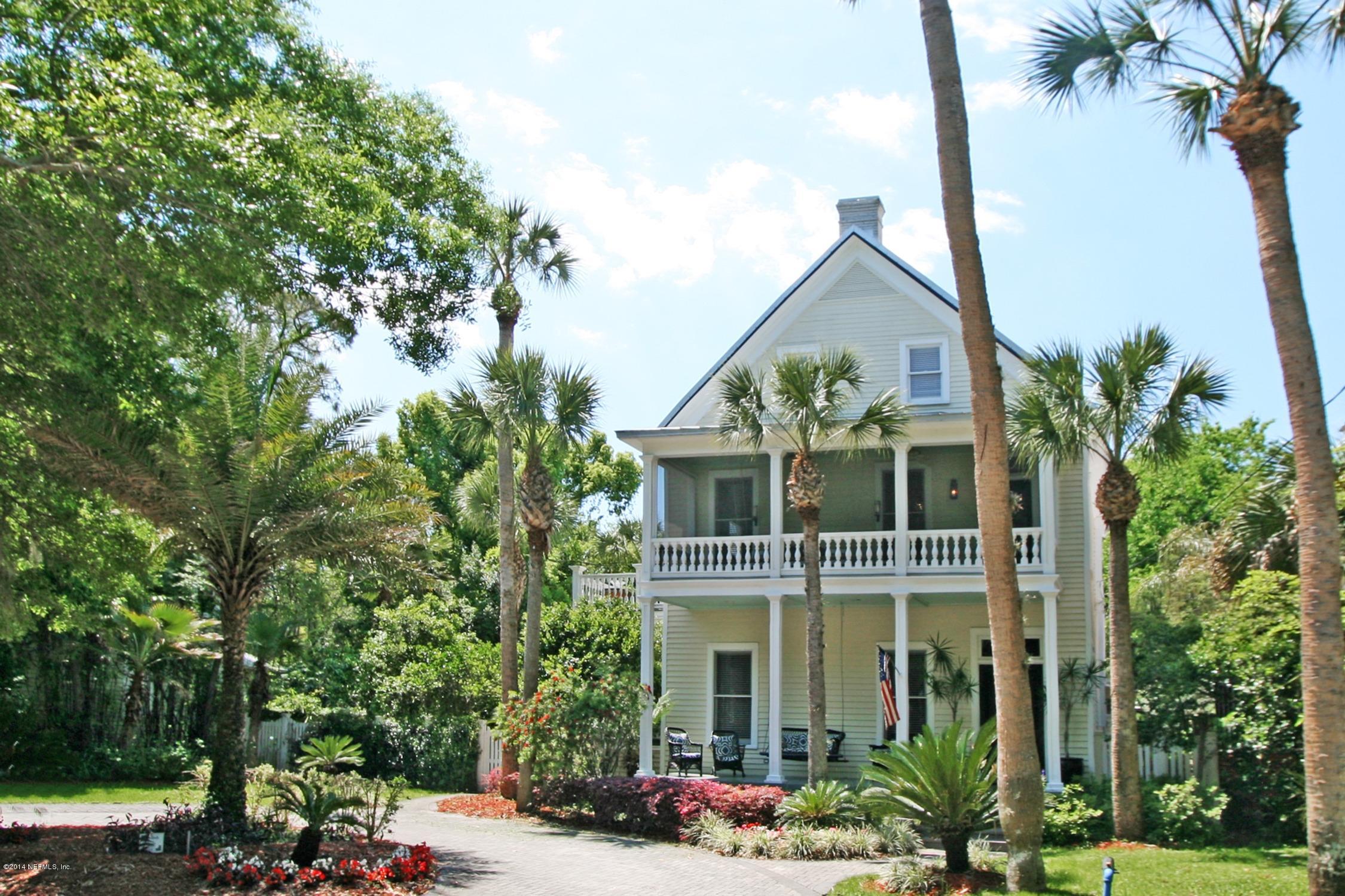 48 Water Street St. Augustine, FL 32084 - Photo 2 of 52 a front view of a house with a yard