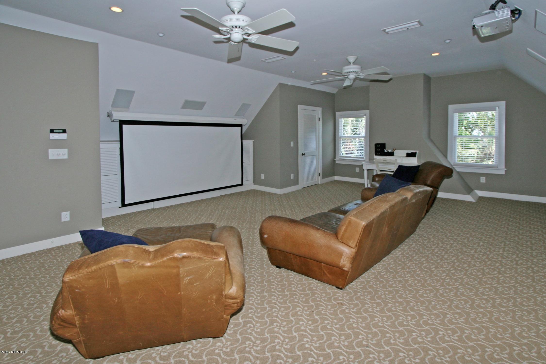 48 Water Street St. Augustine, FL 32084 - Photo 36 of 52 a living room with furniture and a ceiling fan