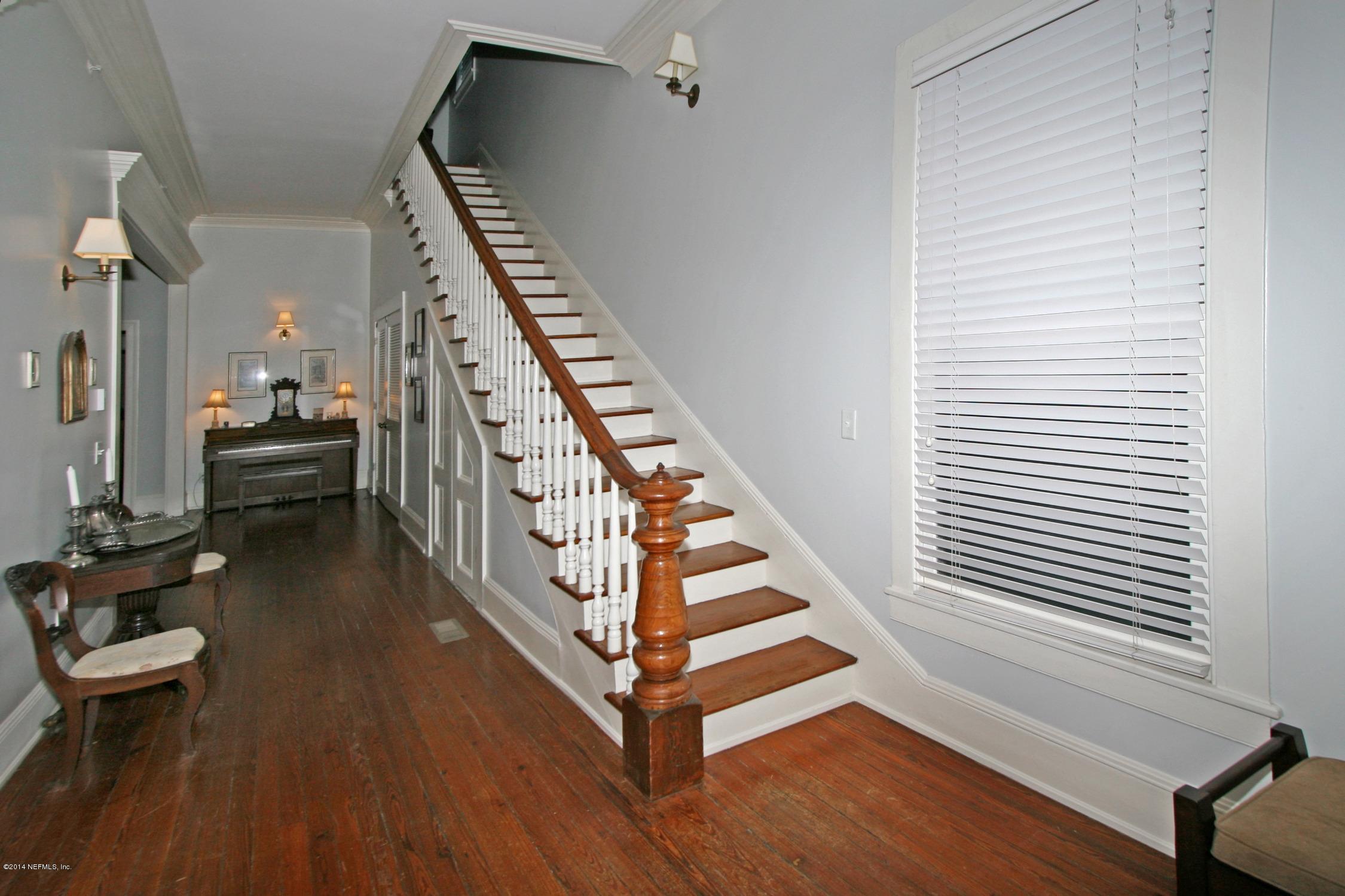 48 Water Street St. Augustine, FL 32084 - Photo 40 of 52 a view of entryway and hall with wooden floor