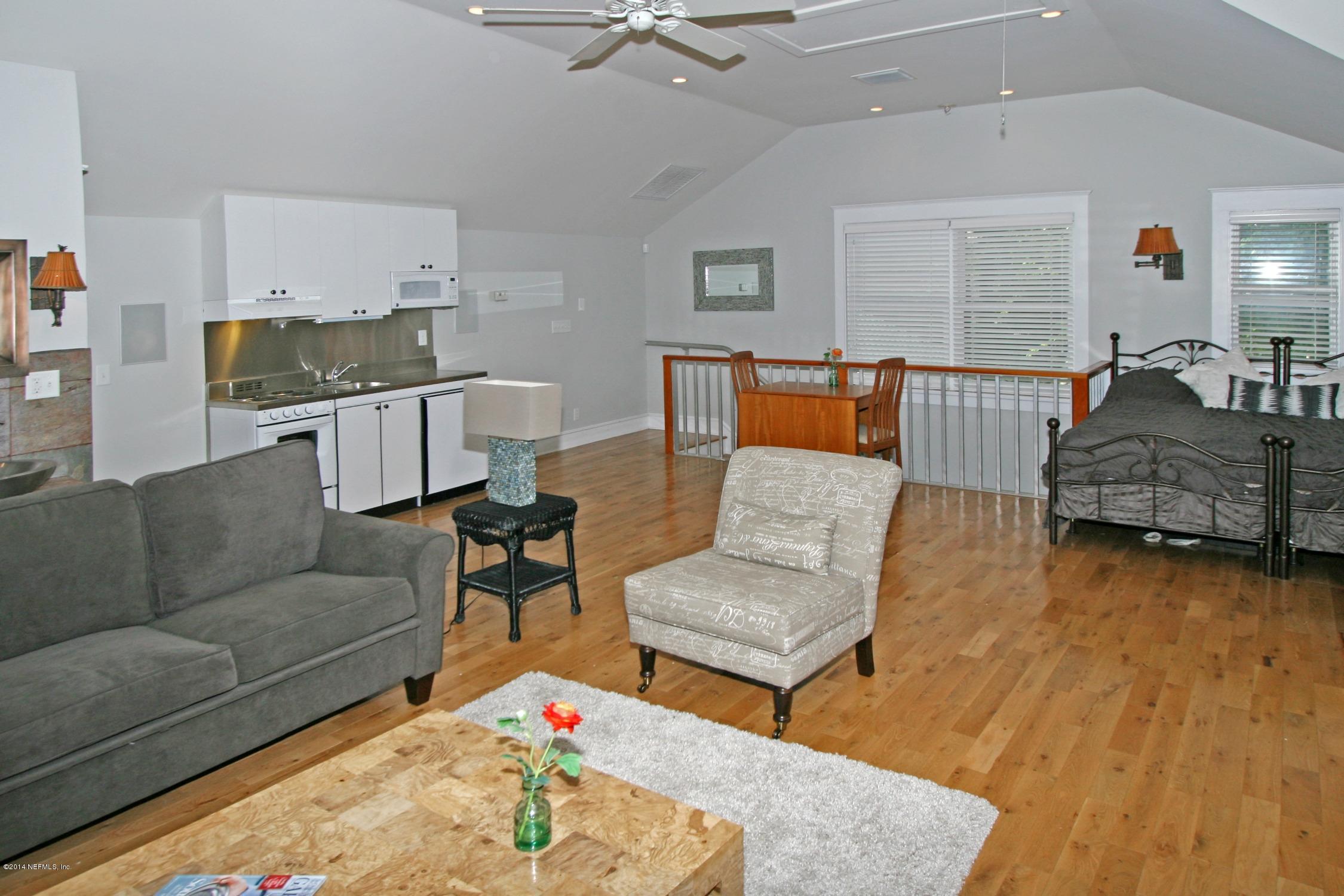 48 Water Street St. Augustine, FL 32084 - Photo 46 of 52 a living room with furniture and a couch