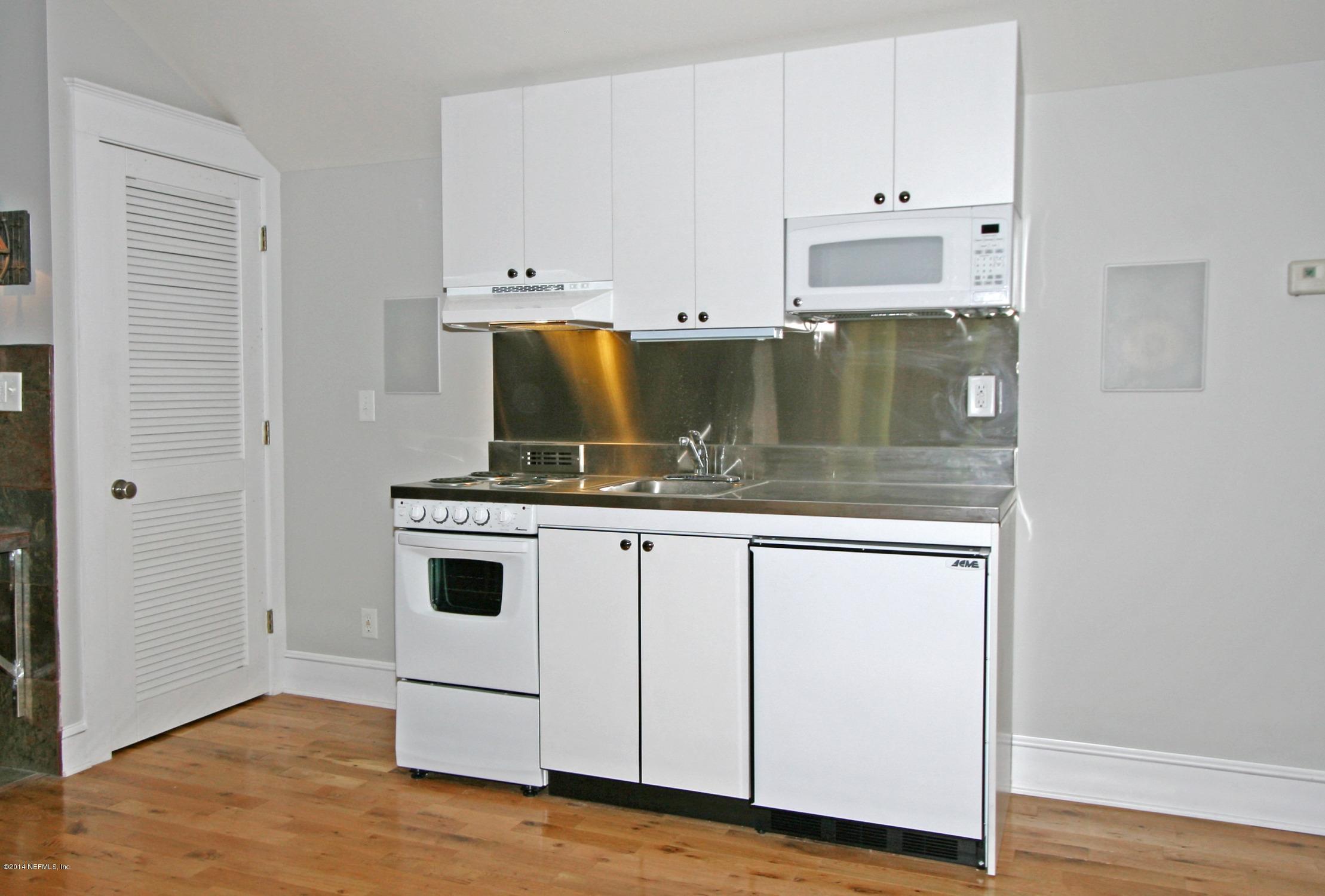 48 Water Street St. Augustine, FL 32084 - Photo 47 of 52 a stove top oven sitting inside of a kitchen