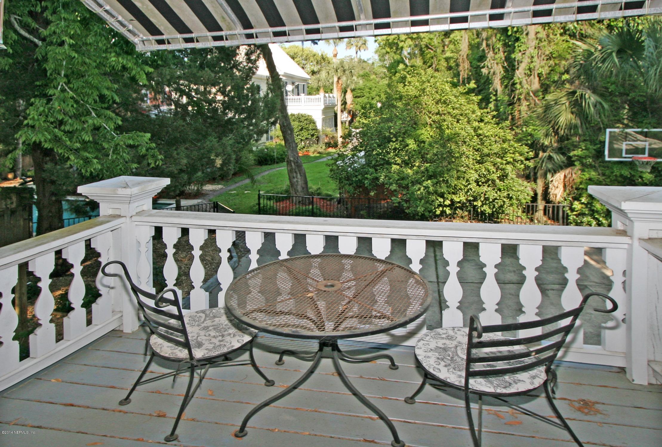 48 Water Street St. Augustine, FL 32084 - Photo 50 of 52 a view of a chair and table in the balcony