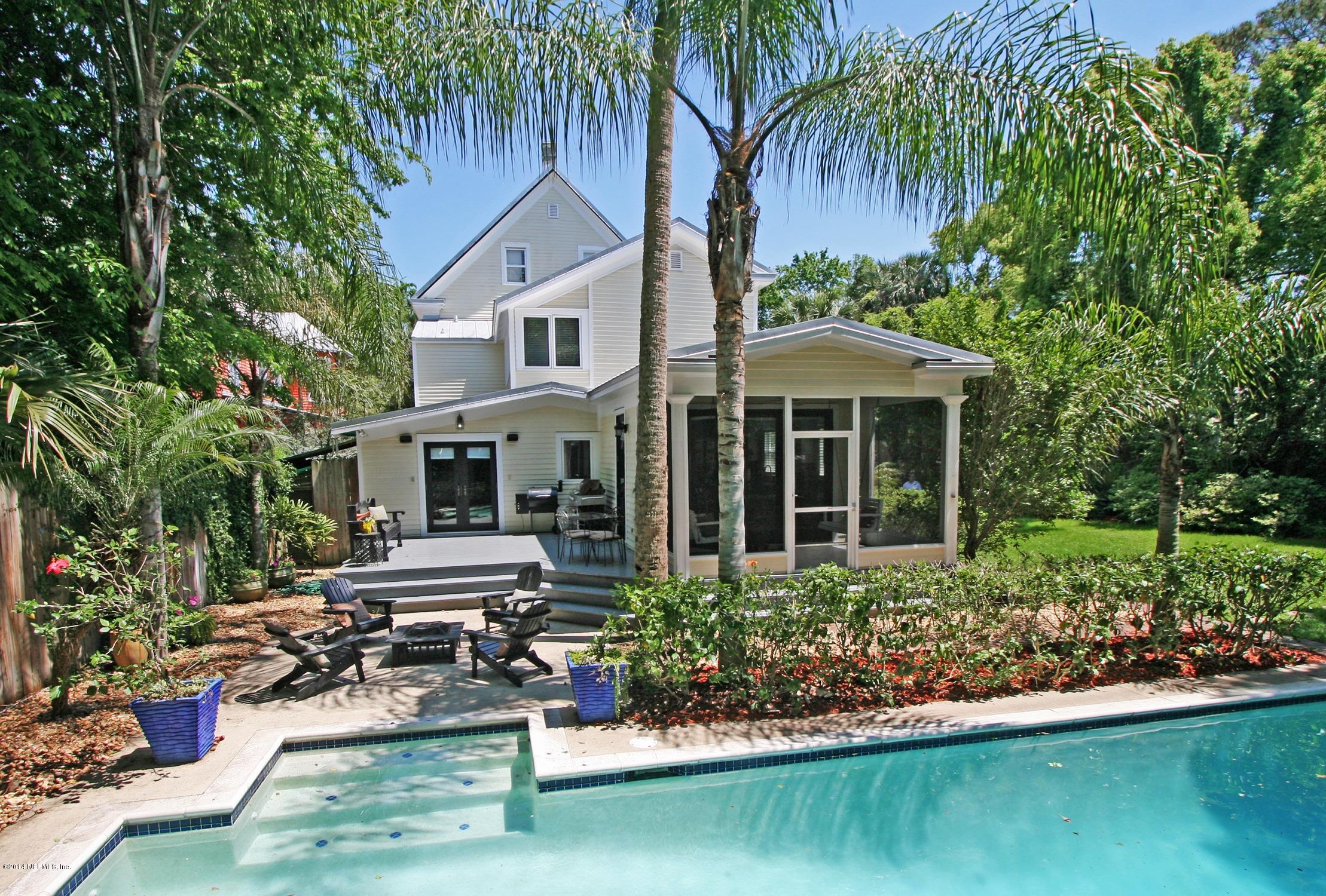 48 Water Street St. Augustine, FL 32084 - Photo 5 of 52 a view of a house with backyard sitting area and swimming pool