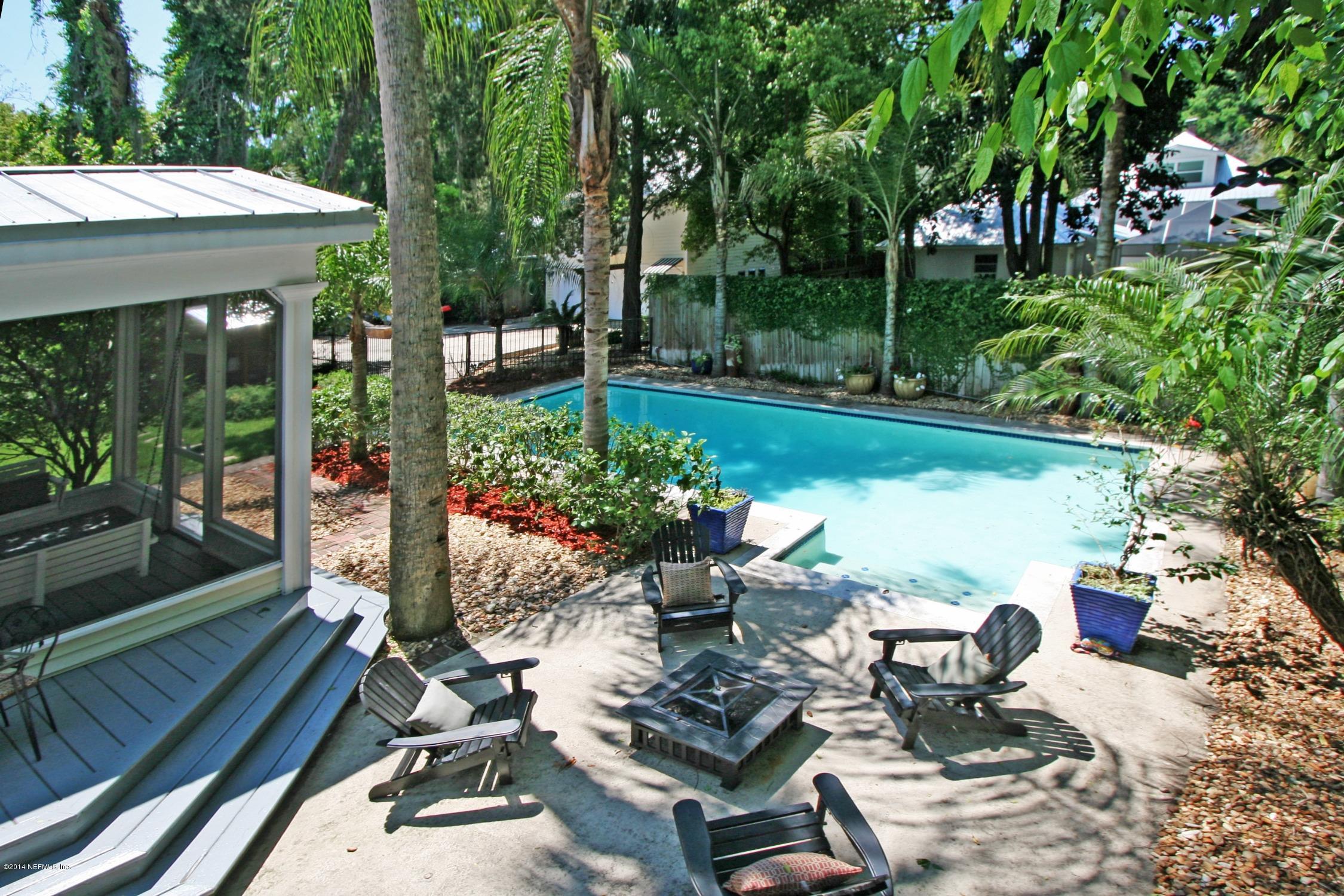 48 Water Street St. Augustine, FL 32084 - Photo 9 of 52 a view of a chairs and table in backyard of a house