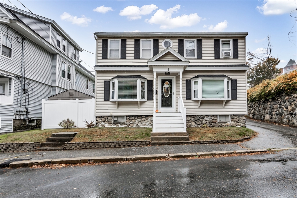 2 Maurice Avenue Lawrence, MA 01841 - Photo 2 of 36 a front view of a house