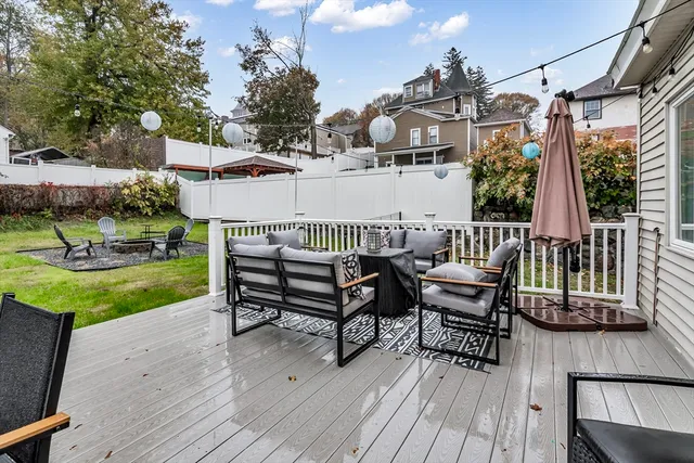 a view of a patio on wooden deck