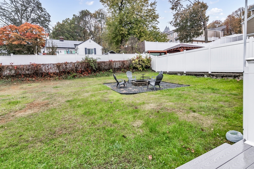 2 Maurice Avenue Lawrence, MA 01841 - Photo 32 of 36 a view of a house with a yard and sitting area