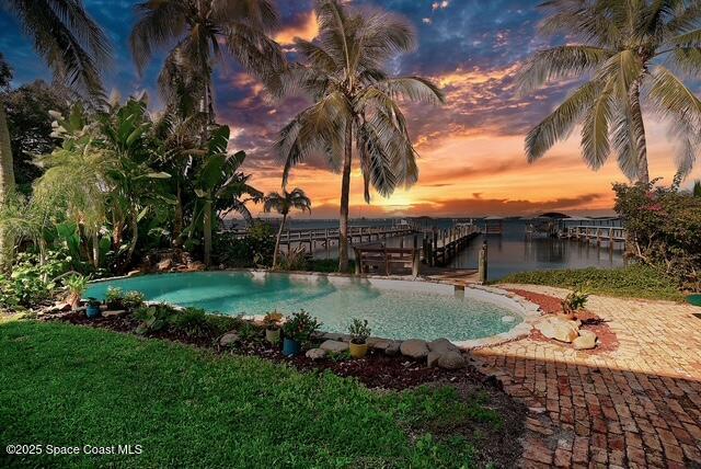 5930 Riverside Drive Melbourne Beach, FL 32951 - Photo 3 of 46 a view of backyard with green space