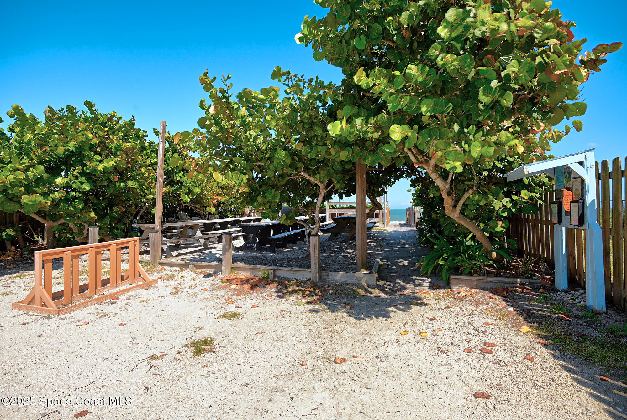 5930 Riverside Drive Melbourne Beach, FL 32951 - Photo 35 of 46 a view of backyard with sitting area