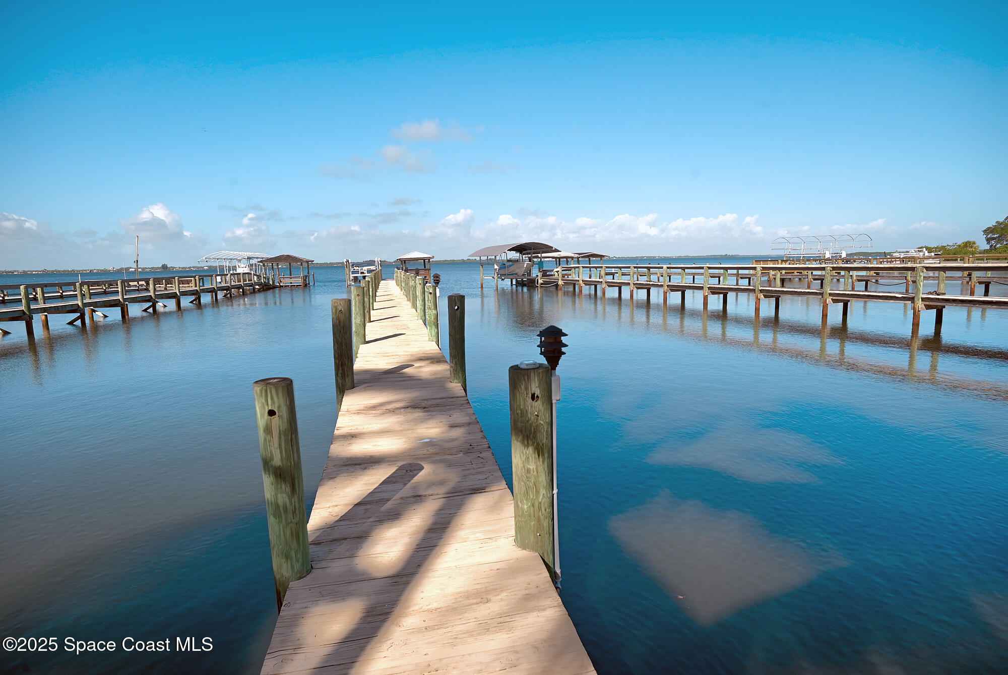 5930 Riverside Drive Melbourne Beach, FL 32951 - Photo 4 of 46 a view of a balcony with an ocean