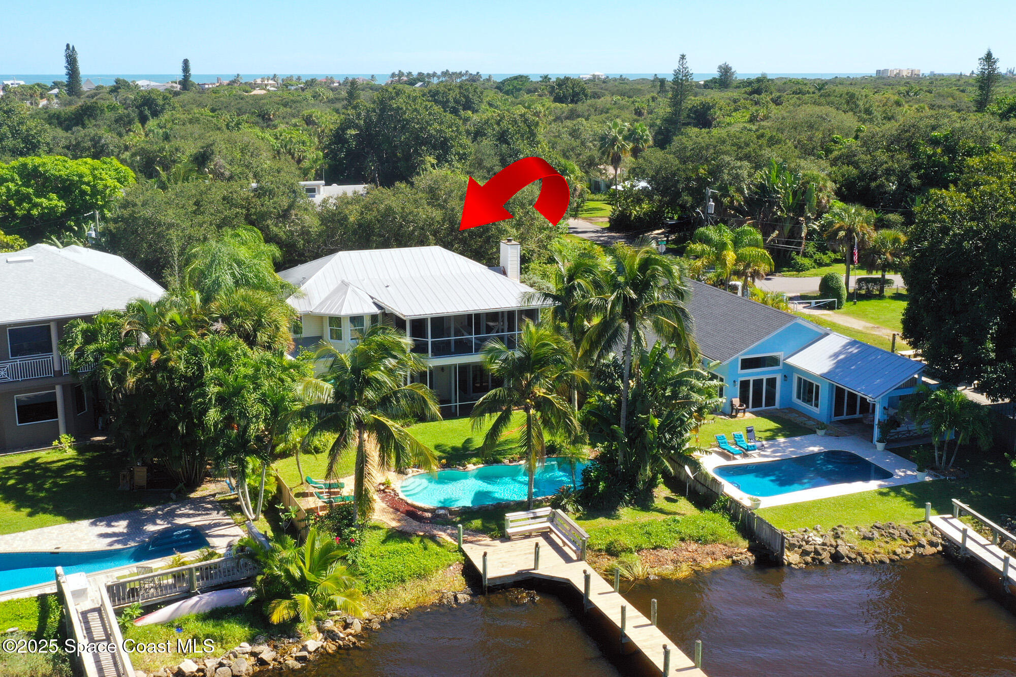 5930 Riverside Drive Melbourne Beach, FL 32951 - Photo 43 of 46 a view of a table and chairs in patio