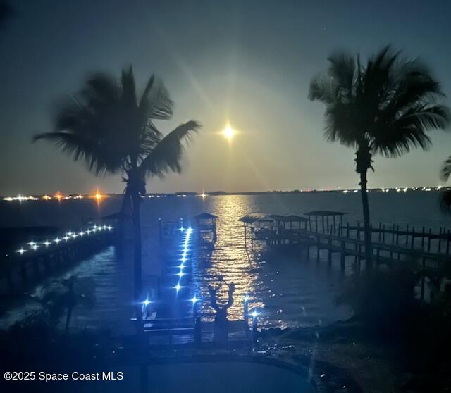 5930 Riverside Drive Melbourne Beach, FL 32951 - Photo 45 of 46 a sunset view with swimming pool