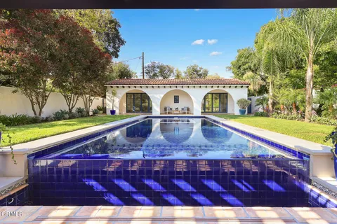 a view of a house with a swimming pool