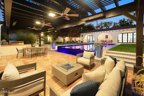 a view of a dining room with couches and chairs