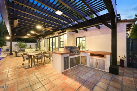 a open kitchen with stainless steel appliances granite countertop a stove and cabinets
