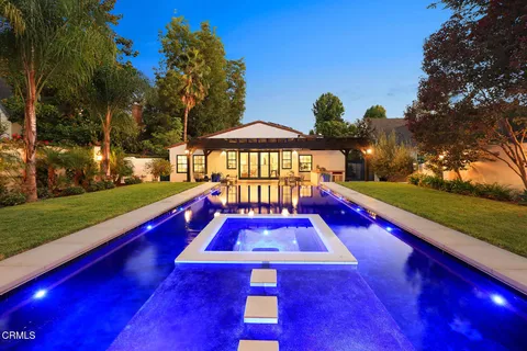 a view of an outdoor space pool patio and outdoor seating