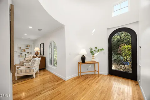 a view of livingroom with furniture and workspace