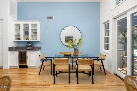 a view of a livingroom with furniture and wooden floor