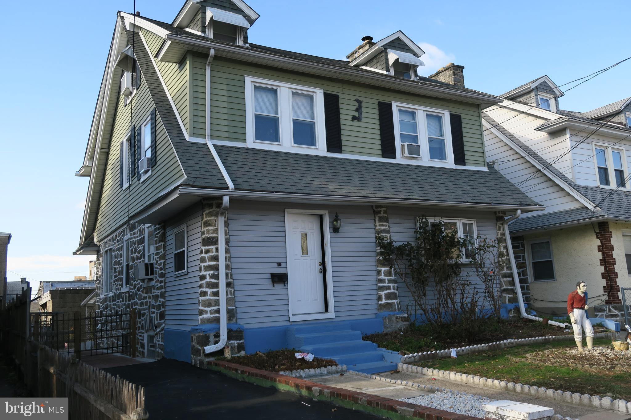 Front entrance into enclosed porch/sunroom