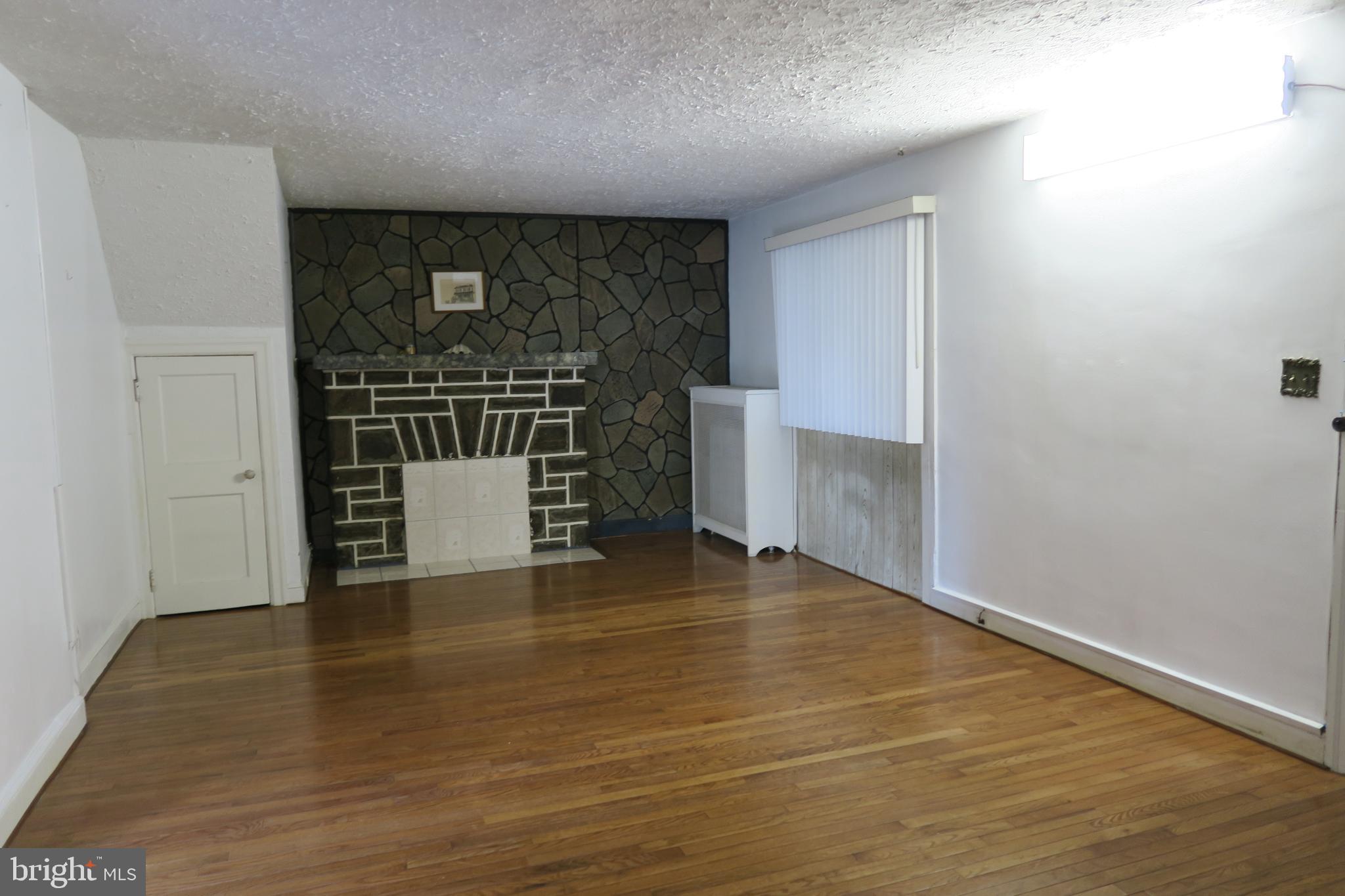 10 Overhill Road Upper Darby, PA 19082 - Photo 2 of 26 Spacious Living Room with hardwood floors