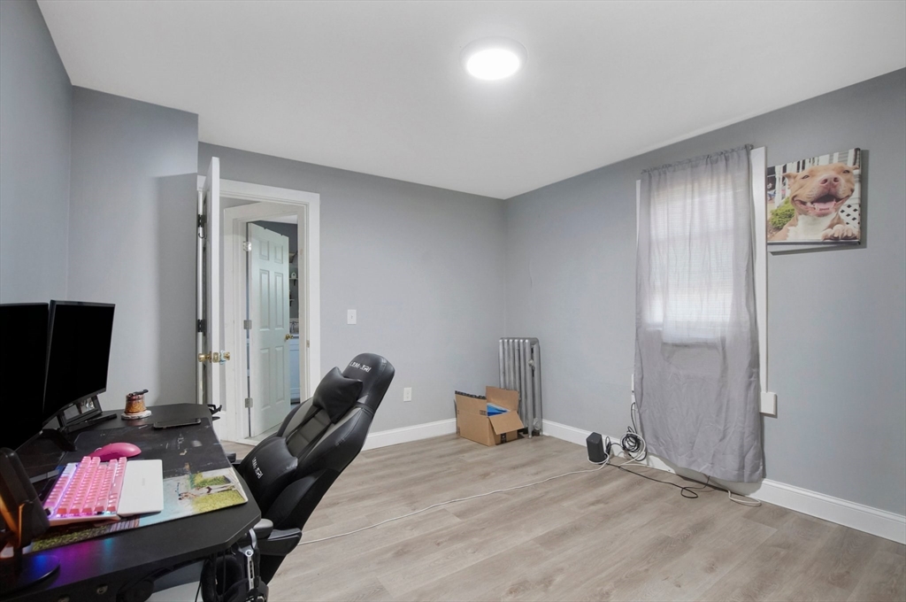 15 Eldert Street Springfield, MA 01109 - Photo 20 of 28 a bedroom with a workspace