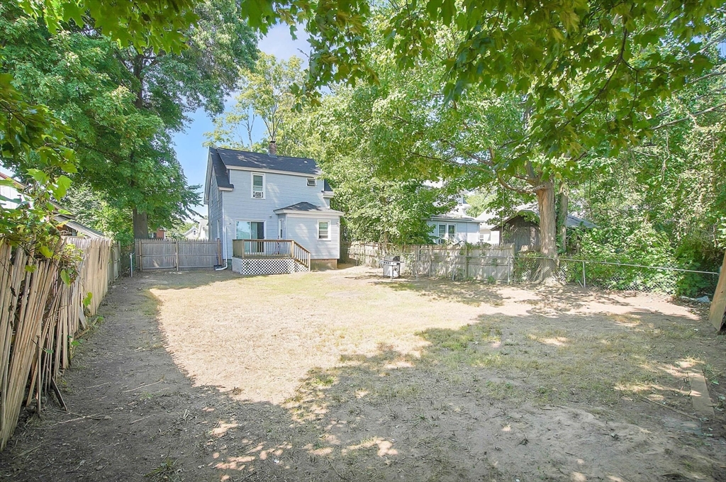 15 Eldert Street Springfield, MA 01109 - Photo 25 of 28 a house with a trees in front of it
