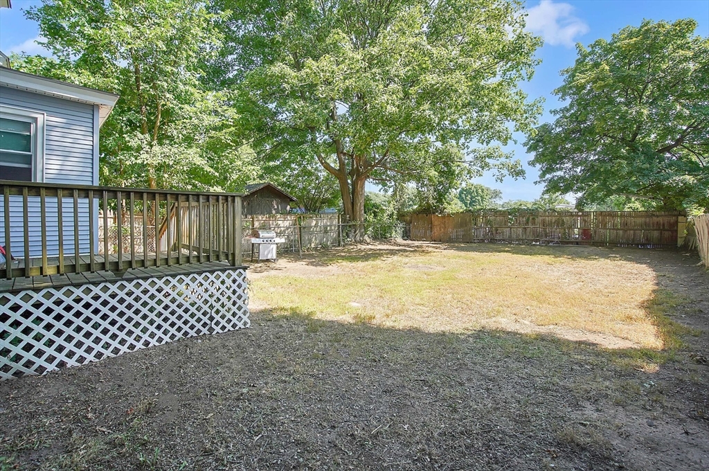 15 Eldert Street Springfield, MA 01109 - Photo 26 of 28 a view of a yard with wooden fence
