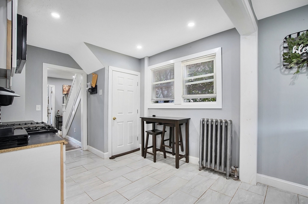 15 Eldert Street Springfield, MA 01109 - Photo 6 of 28 a view of kitchen with furniture and window