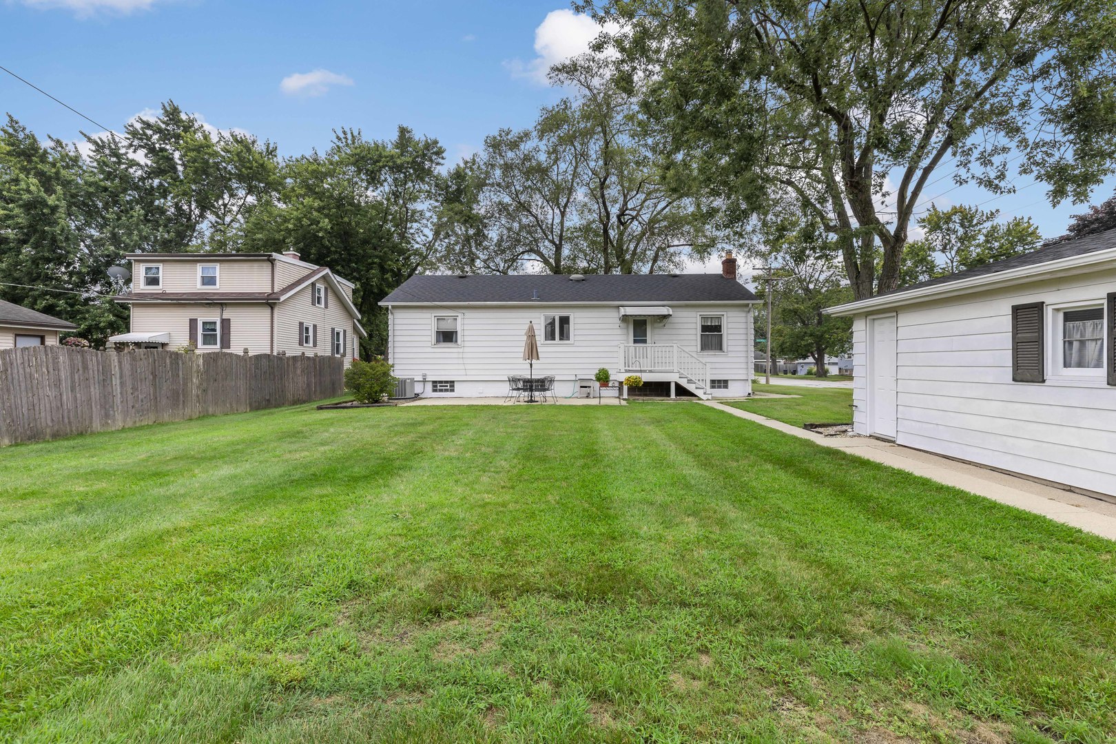 17905 Ridgewood Avenue Lansing, IL 60438 - Photo 17 of 18 a front view of house with yard and green space