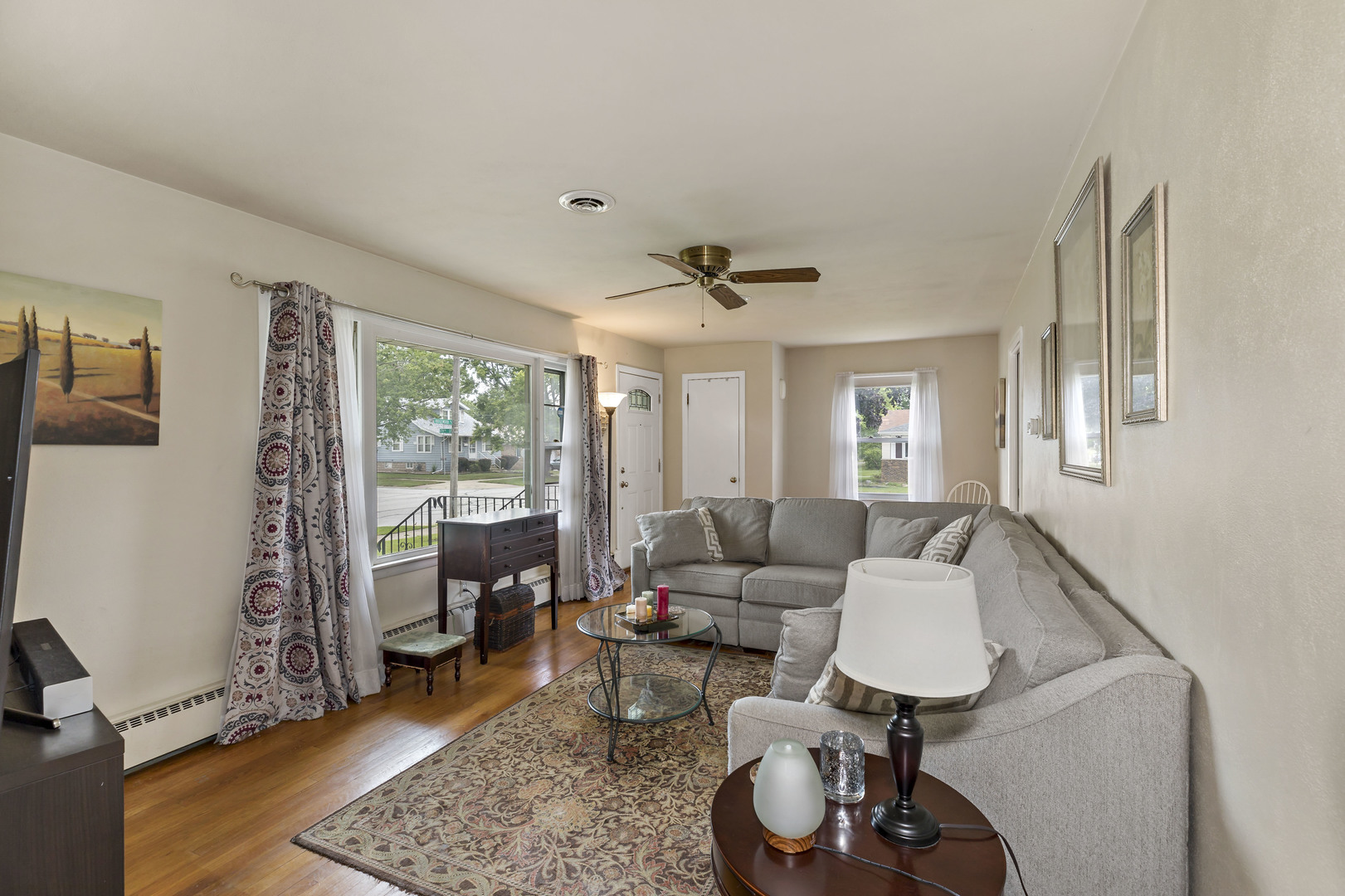 17905 Ridgewood Avenue Lansing, IL 60438 - Photo 3 of 18 a living room with furniture and a rug