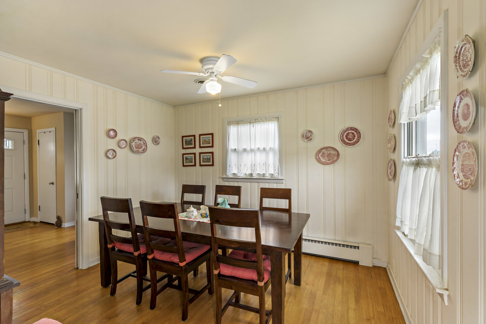 17905 Ridgewood Avenue Lansing, IL 60438 - Photo 10 of 18 a view of a dining room with furniture and wooden floor