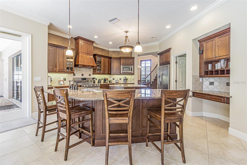 20411 Lace Cascade Road Land O Lakes, FL 34637 - Photo 11 of 44 a view of a dining room with furniture window and wooden floor