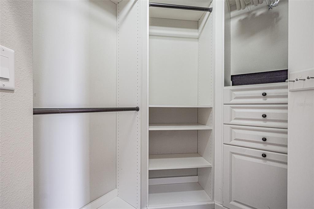 20411 Lace Cascade Road Land O Lakes, FL 34637 - Photo 19 of 44 a view of walk in closet