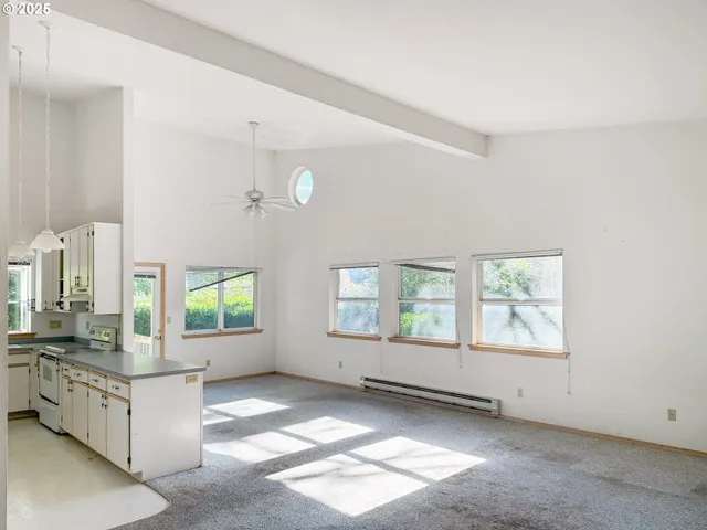 a view of kitchen with windows