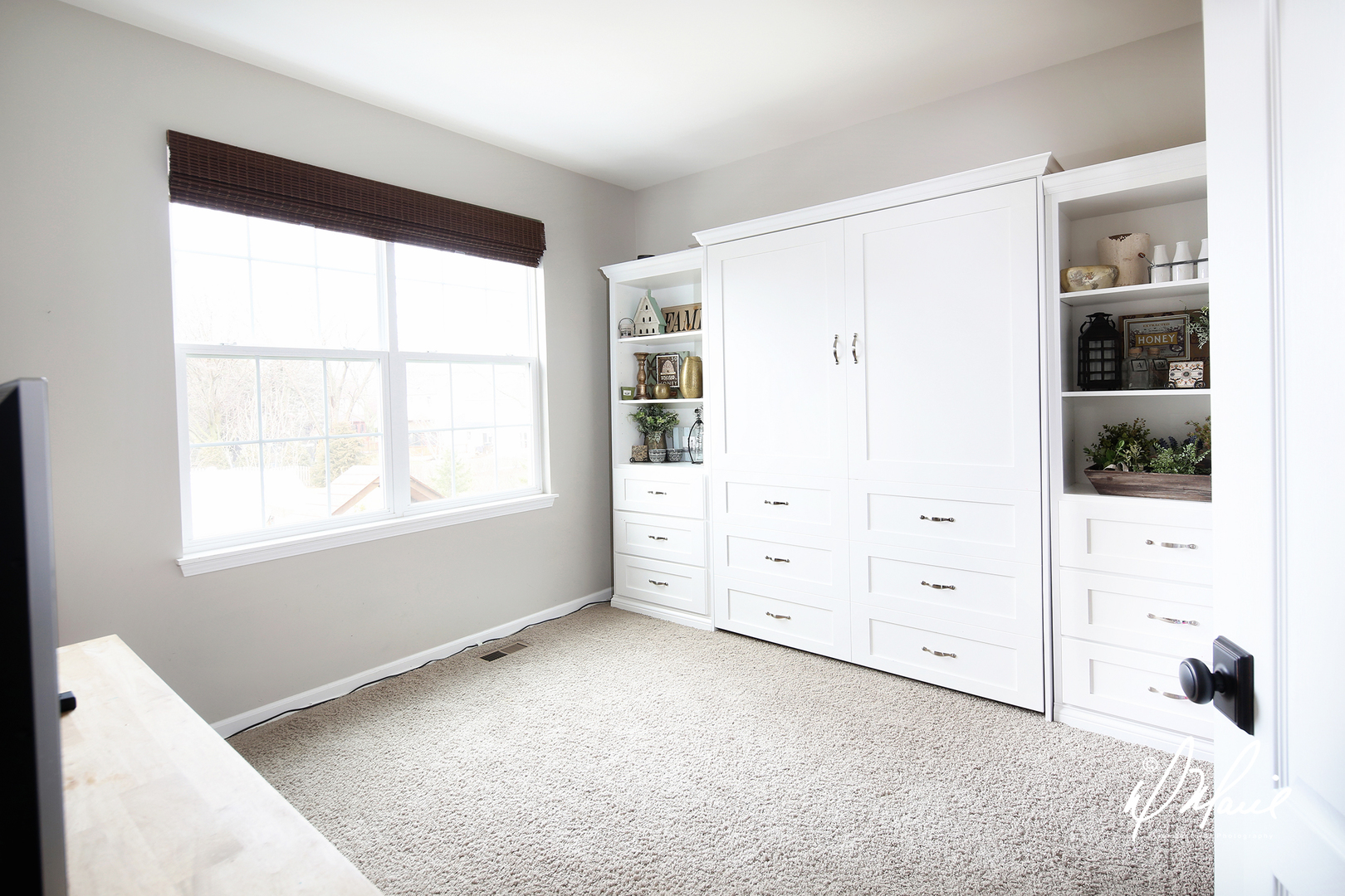 702 Amber Ridge Avenue Glen Ellyn, IL 60137 - Photo 12 of 26 a view of a bedroom with cabinet and mirror