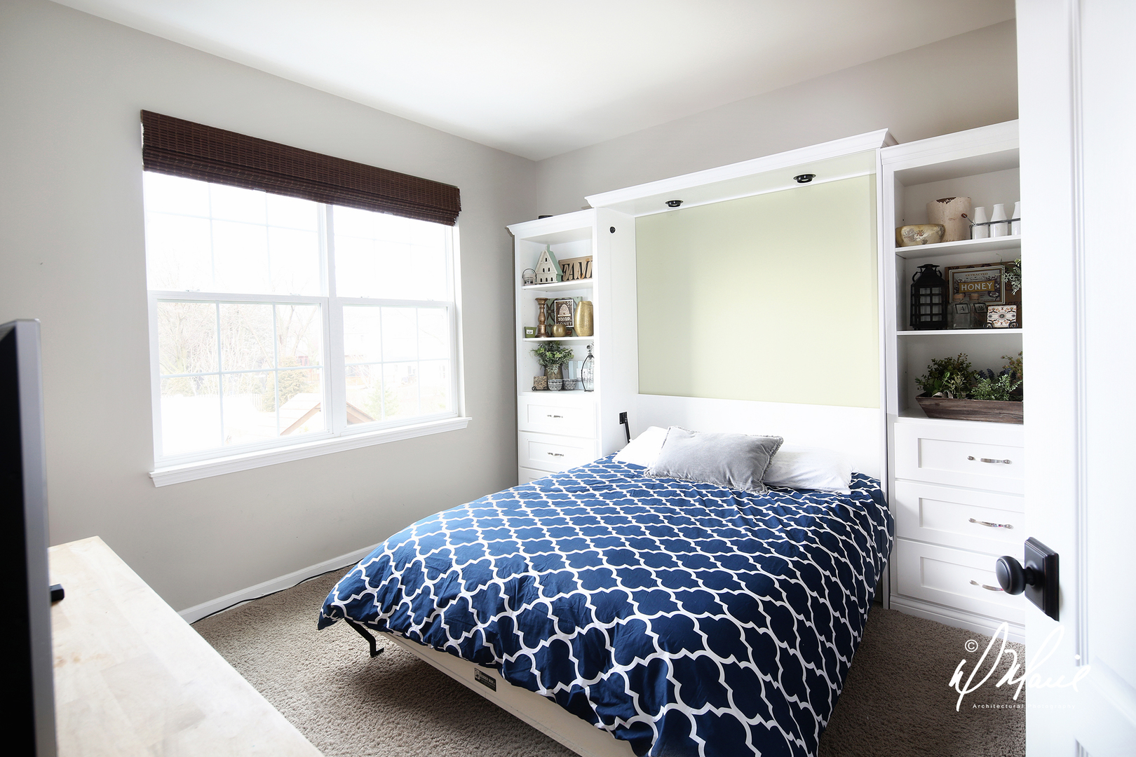 702 Amber Ridge Avenue Glen Ellyn, IL 60137 - Photo 13 of 26 a bedroom with a large bed and a window