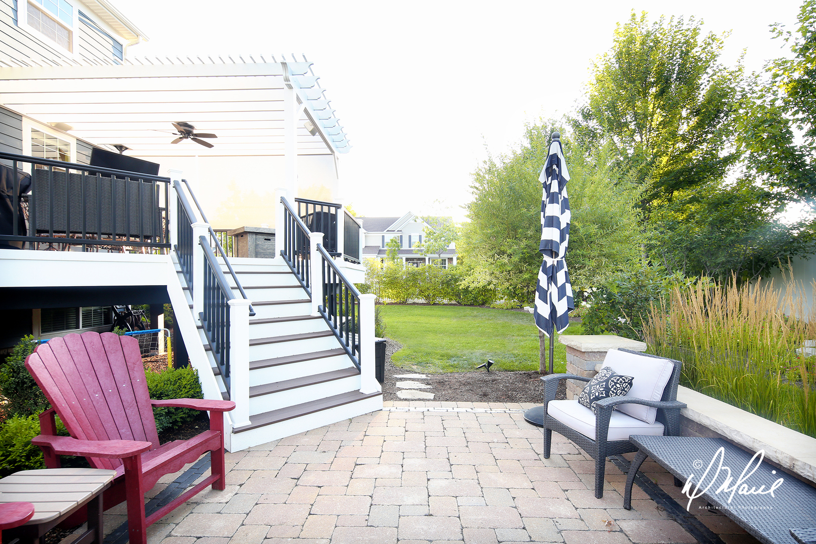 702 Amber Ridge Avenue Glen Ellyn, IL 60137 - Photo 22 of 26 a view of a patio with a table chairs and a yard