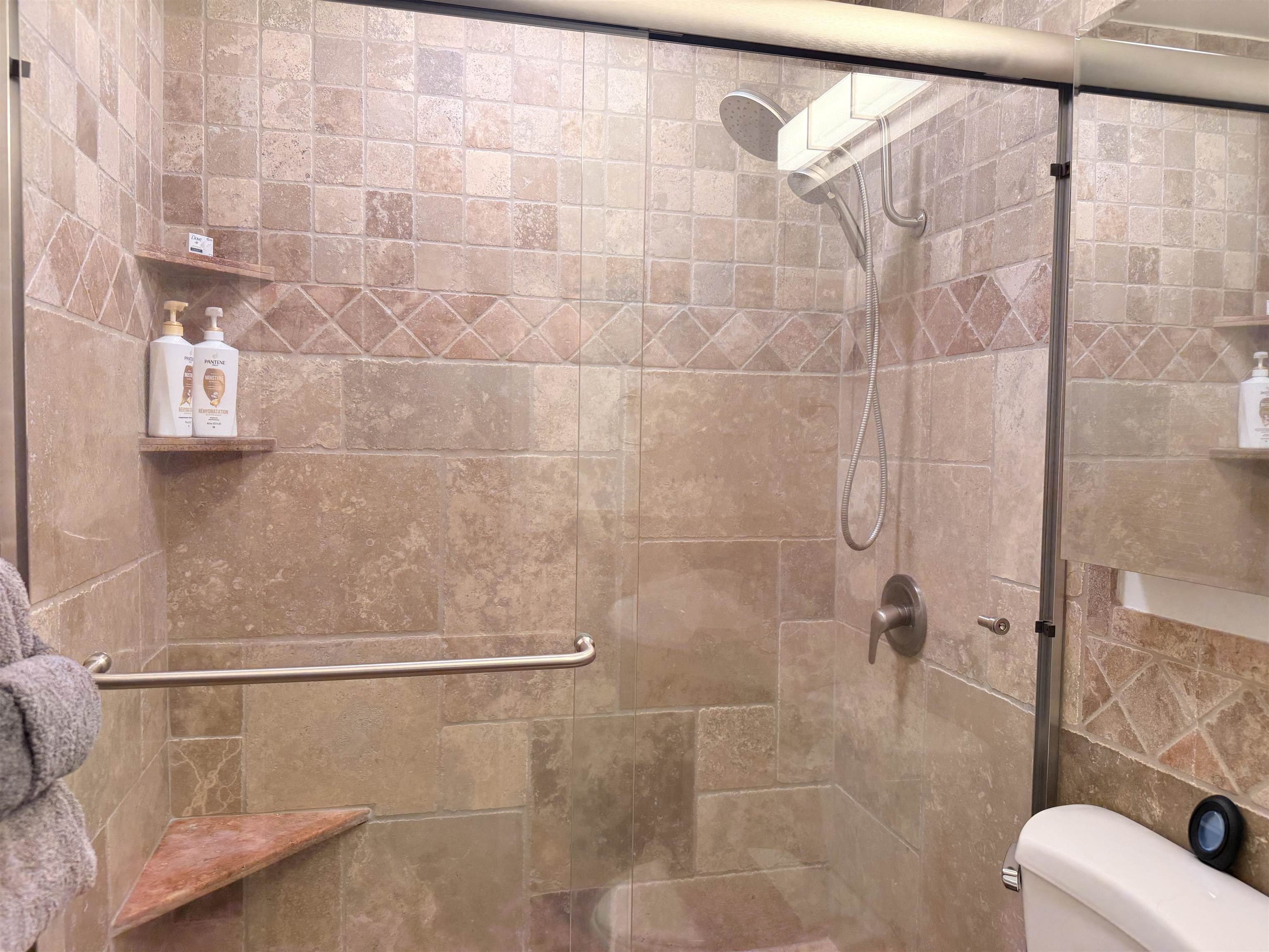 3701 Lower Honoapiilani Road, Unit 105 Lahaina, HI 96761 - Photo 13 of 36 a bathroom with a shower