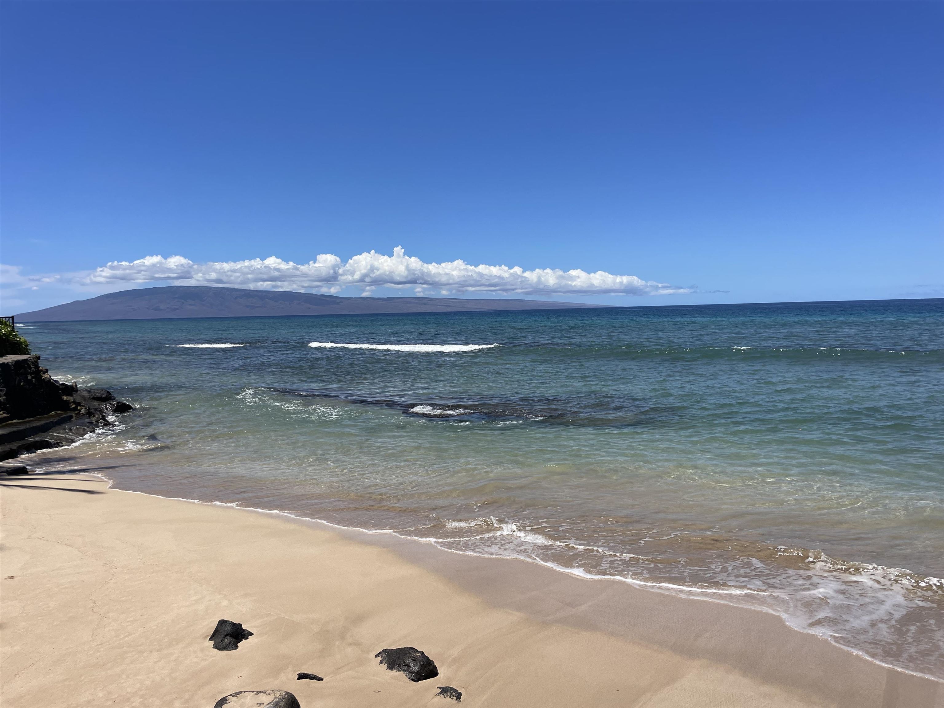 3701 Lower Honoapiilani Road, Unit 105 Lahaina, HI 96761 - Photo 26 of 36 a view of water heater room with wooden floor