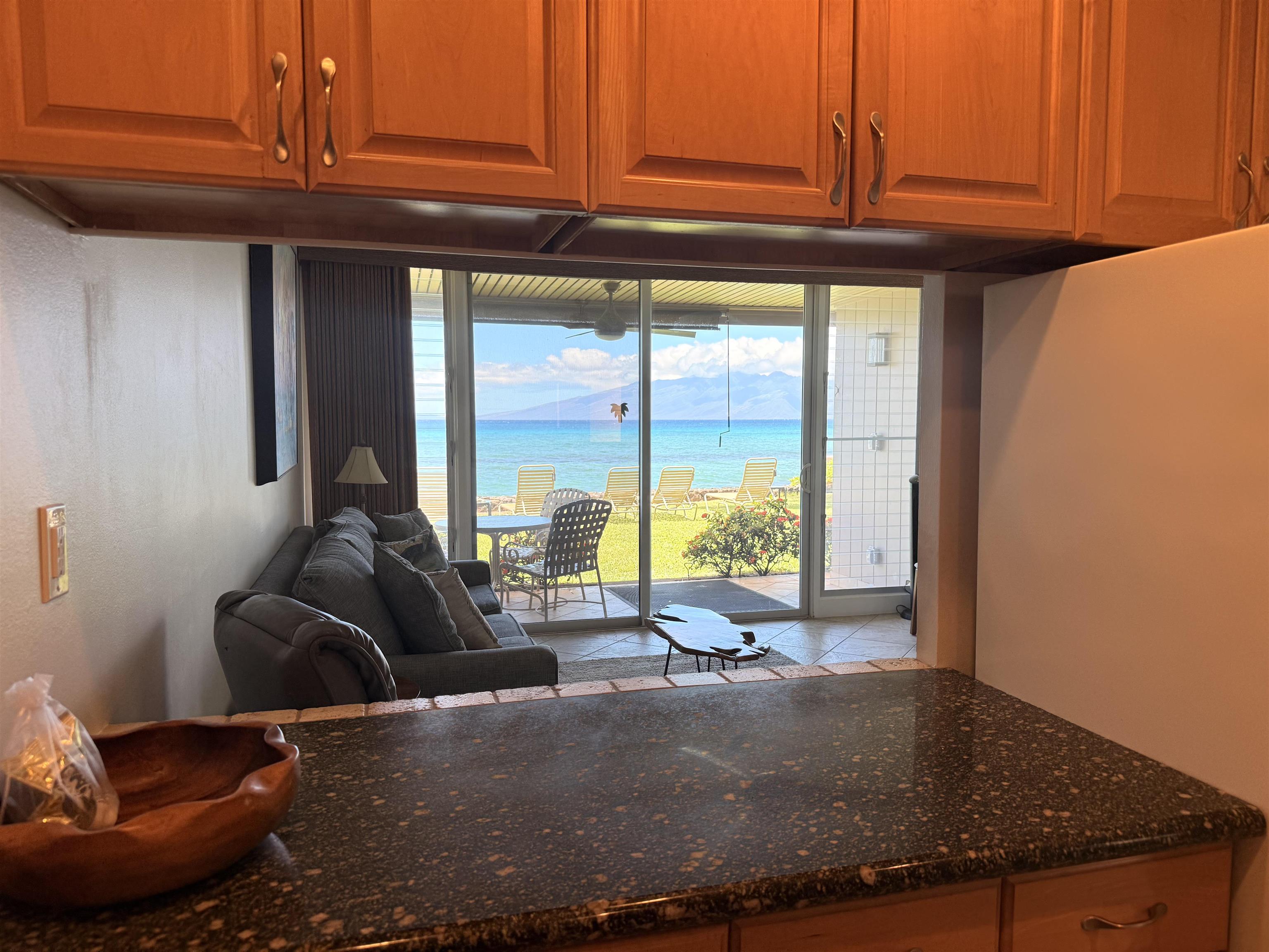 3701 Lower Honoapiilani Road, Unit 105 Lahaina, HI 96761 - Photo 9 of 36 a room with furniture