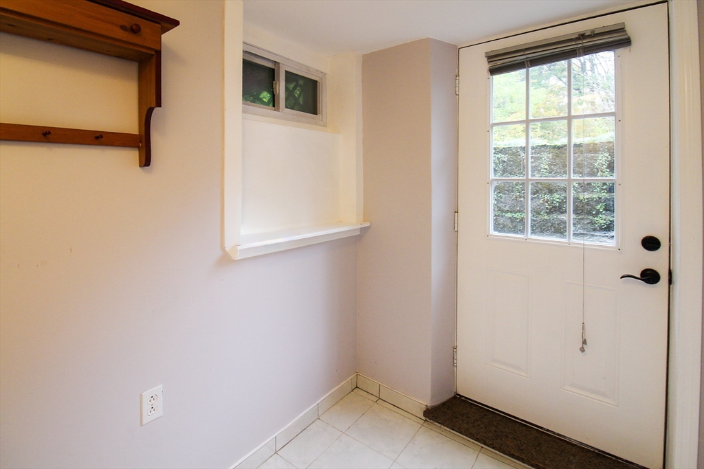 1116 George Hill Road Lancaster, MA 01523 - Photo 33 of 37 a view of a small space with wooden floor and a window