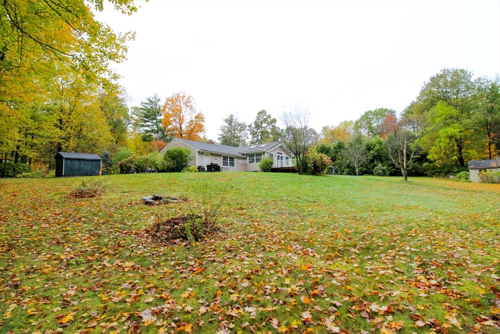 1116 George Hill Road Lancaster, MA 01523 - Photo 36 of 37 a view of a garden with a building