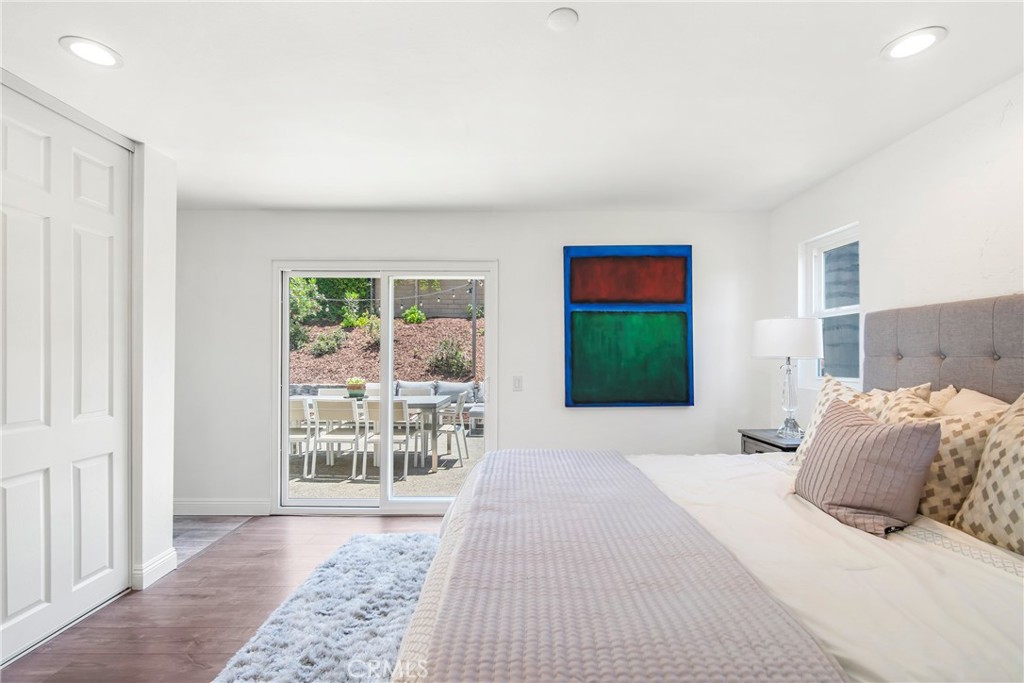 2810 Bello Panorama San Clemente, CA 92673 - Photo 33 of 67 a bedroom with a large bed and a window