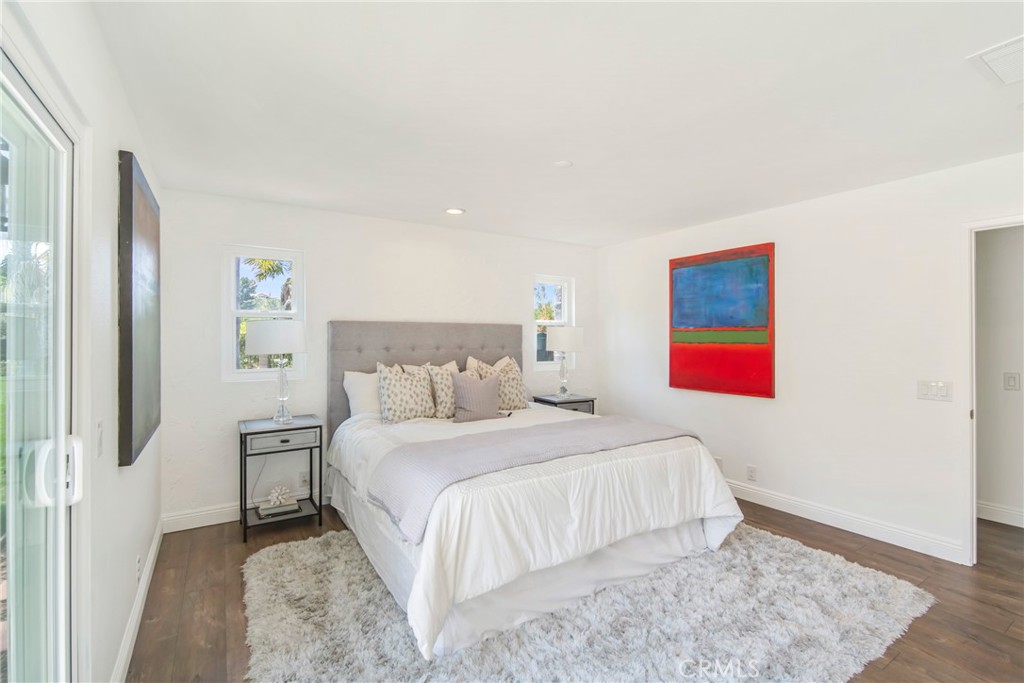 2810 Bello Panorama San Clemente, CA 92673 - Photo 34 of 67 a bedroom with a bed and painting on the wall