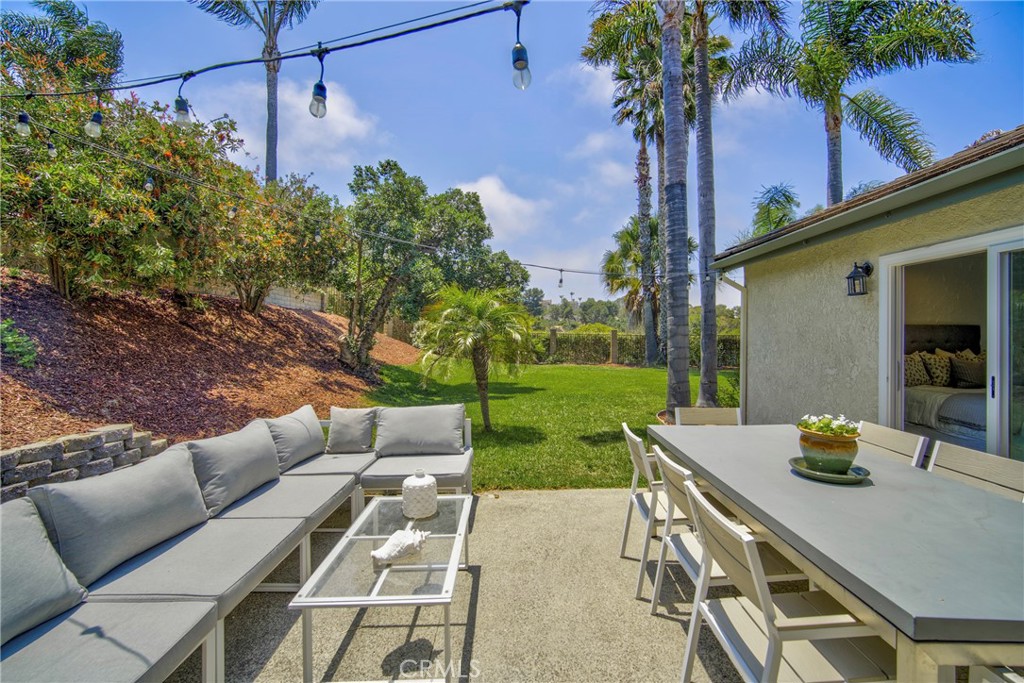 2810 Bello Panorama San Clemente, CA 92673 - Photo 45 of 67 a view of a patio with couches table and chairs and potted plants