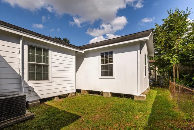 a view of a backyard with plants