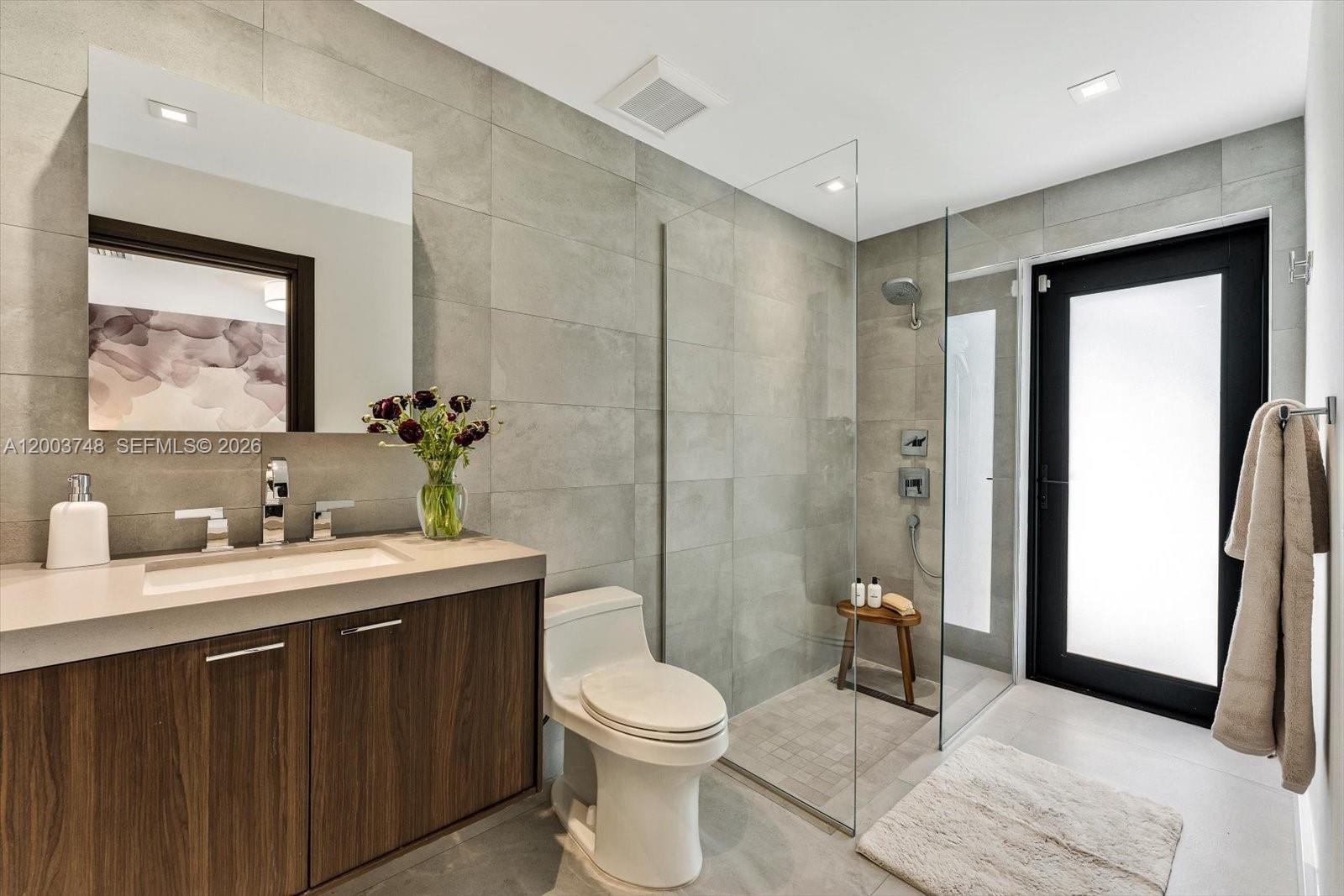 2675 Hackney Road Weston, FL 33331 - Photo 50 of 61 a bathroom with a sink toilet and shower