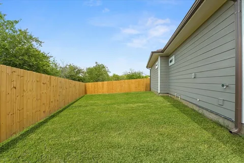 a view of a backyard with a cabin